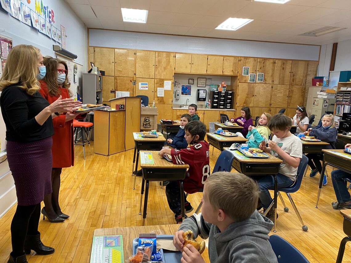 Superintendent Arntzen with students